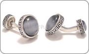 Double sided cufflinks with grey cat's eye