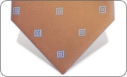 Brown tie with blue squares