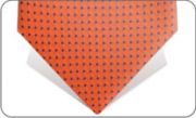 Orange with little navy blue dots tie