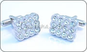 Alveolus cufflinks with white crystals