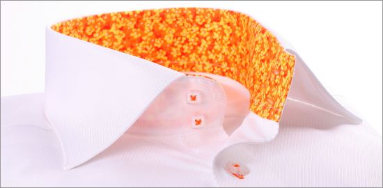 White shirt with orange and yellow collar and cuffs and orange button holes