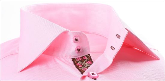 Pink shirt with a brown and pink ribbon