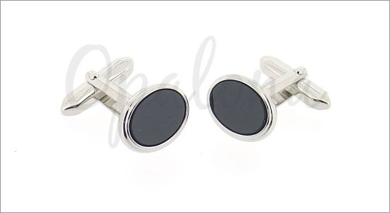 Small oval cufflinks with a black core