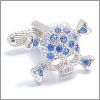 Skull and crossborne cufflinks with blue crystals