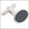 Small oval cufflinks with a black core