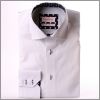 Chemise blanche à col et poignets à pois blancs sur fond marine