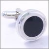 Rond argent� brillant avec un centre noir