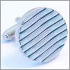 Round wave cufflinks with dark blue striations