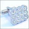 Alveolus cufflinks with white crystals