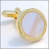 Gilded oval cufflinks with screws and a mother of pearl core
