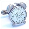 Alarm clock cufflinks with a white background