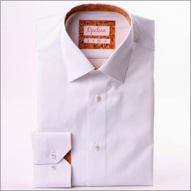 White shirt with brown and orange patterns collar and cuffs