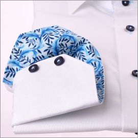 Chemise blanche à col et poignets à motifs feuilles bleues
