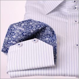 White shirt with thin blue stripes, white and navy blue floral pattern collar and cuffs