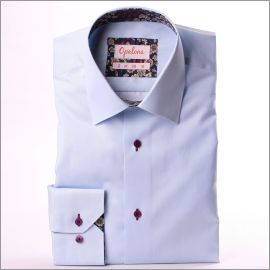 Light blue shirt with beige and purple flower collar and cuffs