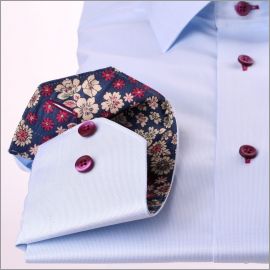 Light blue shirt with beige and purple flower collar and cuffs