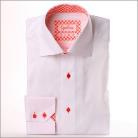 White shirt with orange and pink geometric pattern collar and cuffs