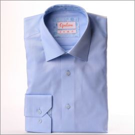 Light blue shirt with blue circular pattern collar and cuffs