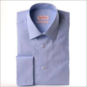 Camisa fil à fil azul claro con puños franceses