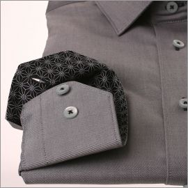 Grey shirt with black and grey patterned collar and cuffs