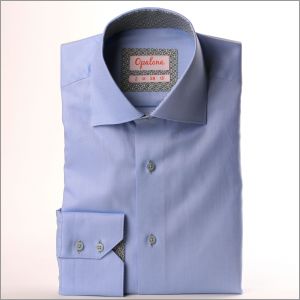 Blue shirt with grey diamond collar and cuffs