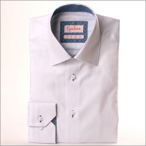 White shirt with blue floral collar and cuffs