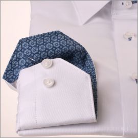 White shirt with blue floral collar and cuffs