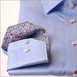 Light blue shirt with blue floral collar and cuffs