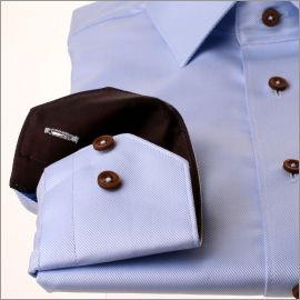 Light blue shirt with brown collar and cuffs