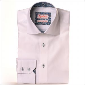 White shirt with blue arabesque collar and cuffs