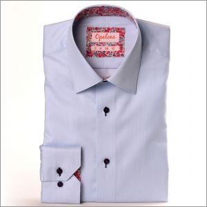 Light blue shirt with pink buds collar and cuffs