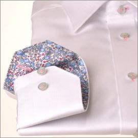 White shirt with blue and pink floral collar and cuffs