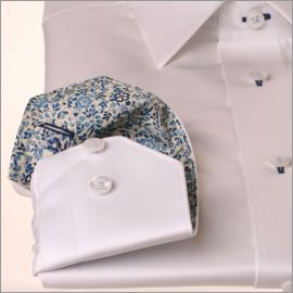 White shirt with navy floral collar and cuffs