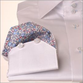 White shirt with blue floral collar and cuffs