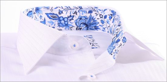 Chemise blanche à col et poignets à fleurs bleues
