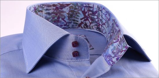 Medium blue shirt with blue and purple patterns collar and cuffs