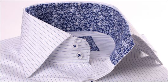 White shirt with thin blue stripes, white and navy blue floral pattern collar and cuffs