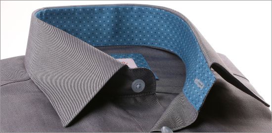 Grey shirt with grey-blue spotty collar and cuffs