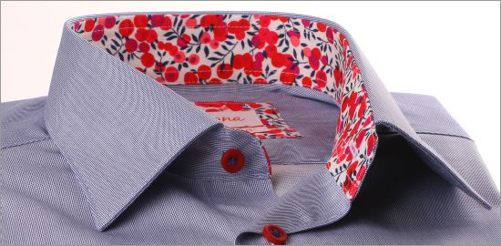 Dark blue shirt with red floral collar and cuffs