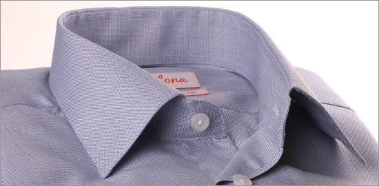 White shirt with small blue patterns