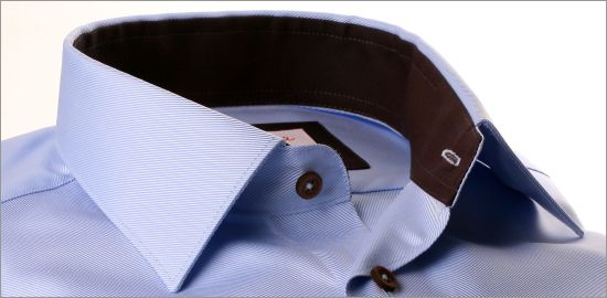 Light blue shirt with brown collar and cuffs