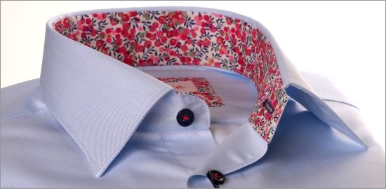 Light blue shirt with pink buds collar and cuffs