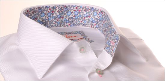 White shirt with blue and pink floral collar and cuffs