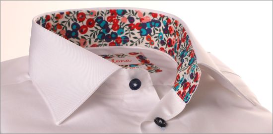 White shirt with red, pink and purple floral collar and cuffs