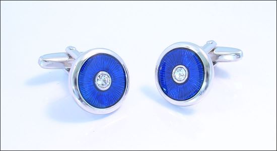 Bouton de manchette rond de résine bleue avec un centre cristal
