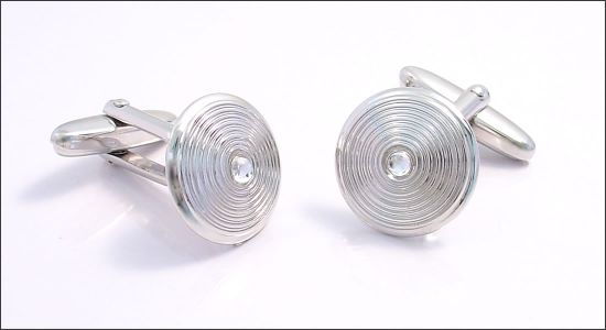 Cone-shaped cufflinks with a transluscent core