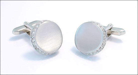 Bouton de manchette rond argenté au contour serti de cristaux blancs