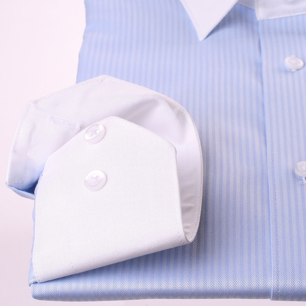 Light blue shirt with white collar and cuffs