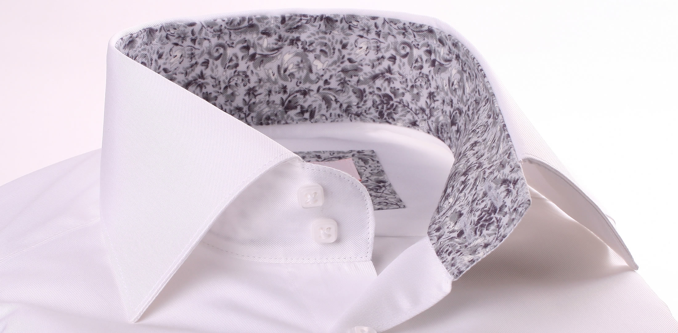 White shirt with light grey pattern collar and cuffs